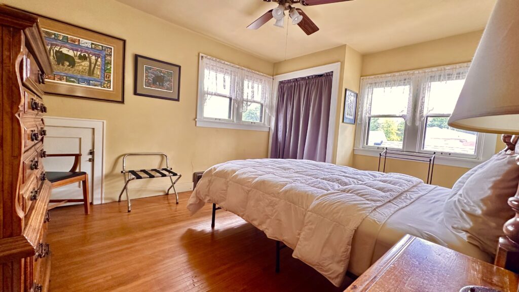 Room 1 furniture and bed from the doorway.